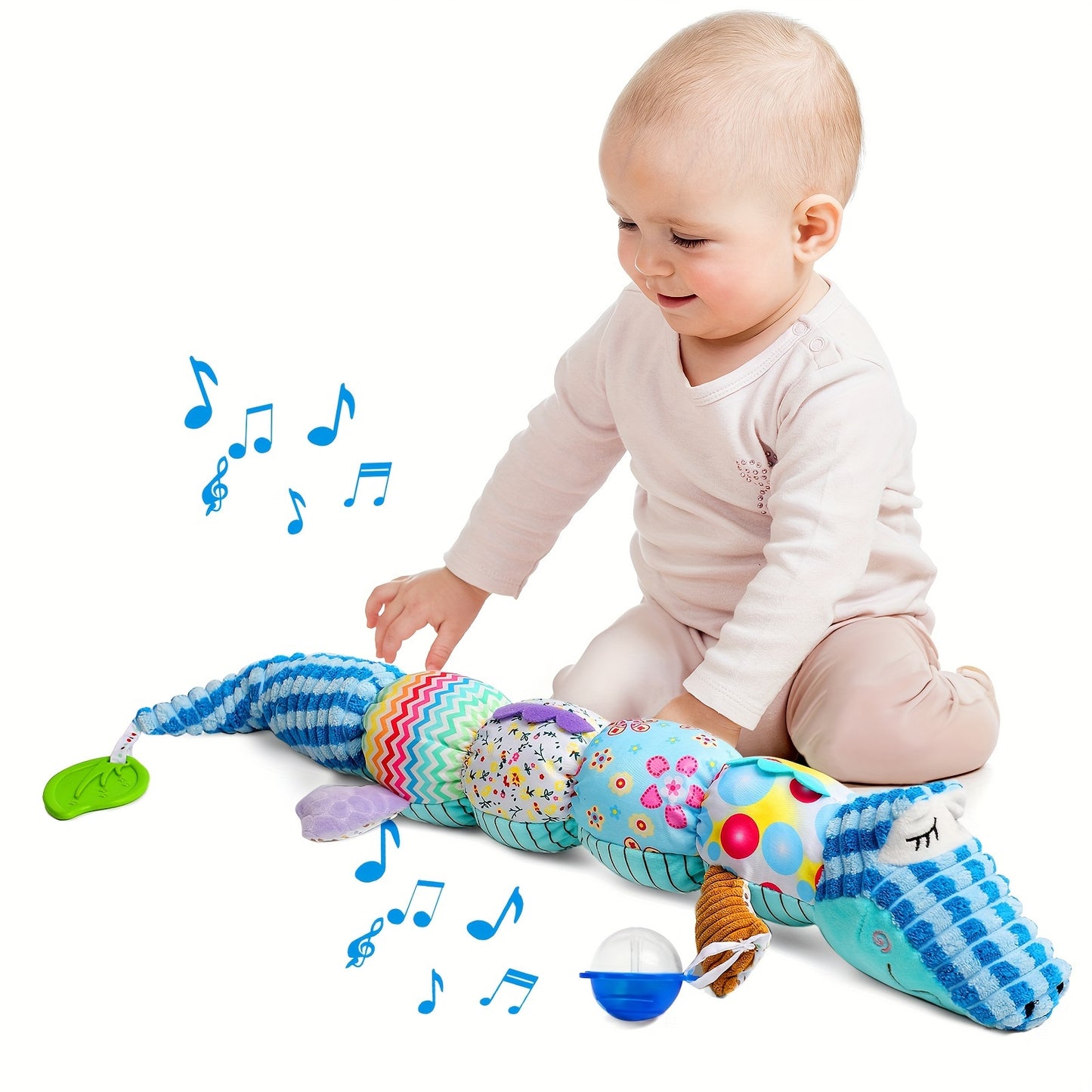 Baby playing with colorful musical stuffed animals for babies from Active Playthings with sound notes