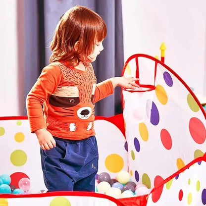 ActivePlaythings portable ball pit for toddlers with colorful polka dots and a child playing inside