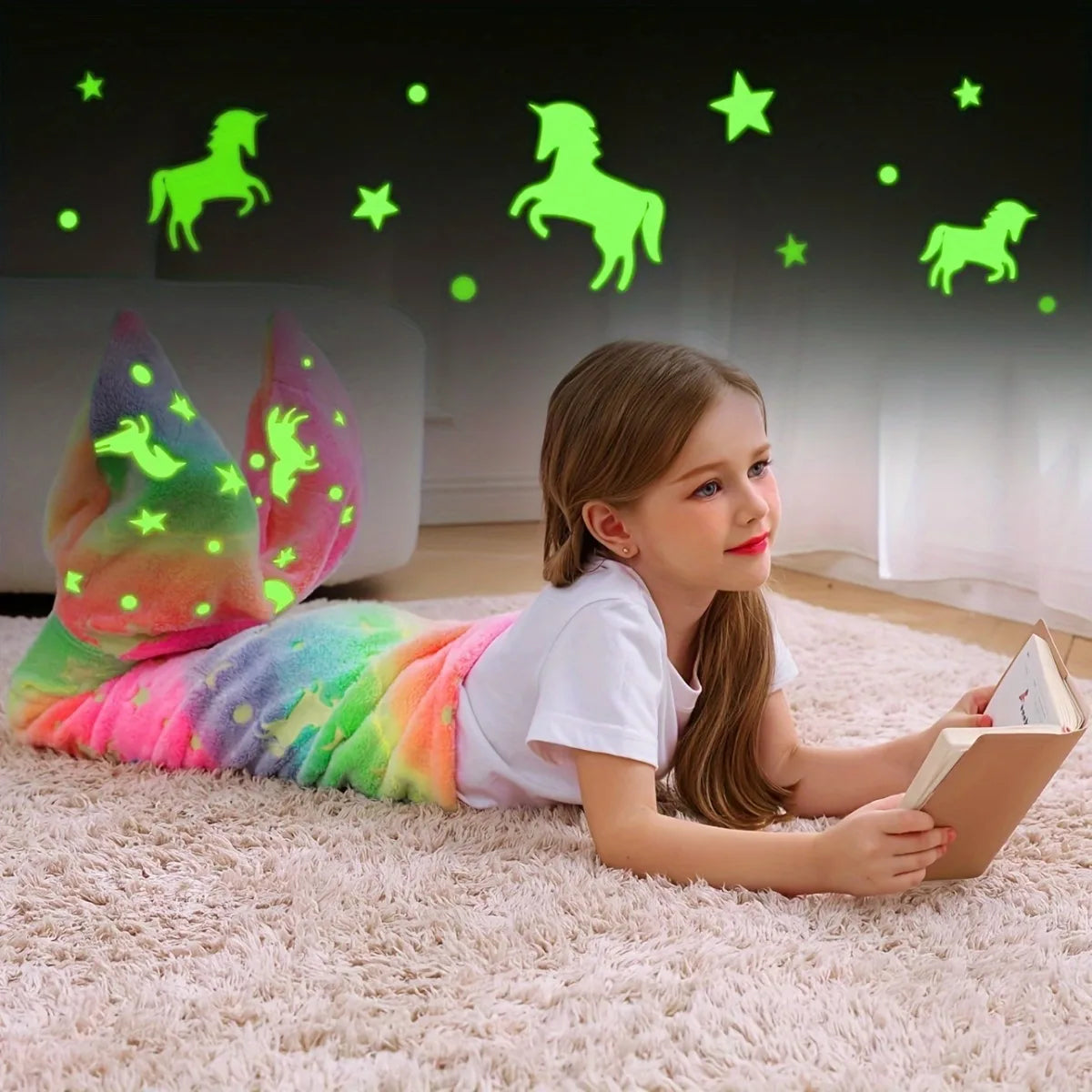 Colorful rainbow mermaid tail blanket for kids with glow-in-the-dark stars and unicorns for cozy reading time