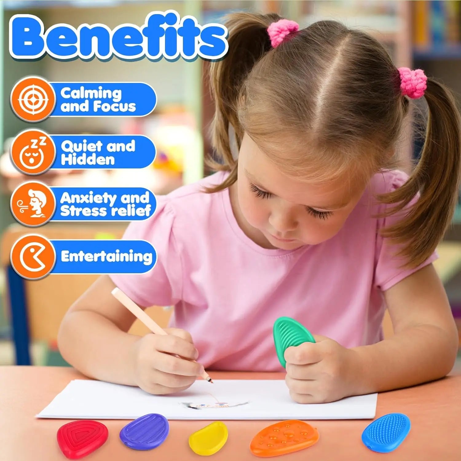 Child using sensory silicone fidget toys to promote calmness and focus while drawing