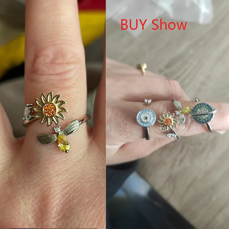 Sunflower fidget ring silver with yellow and orange accents worn on finger by Active Playthings