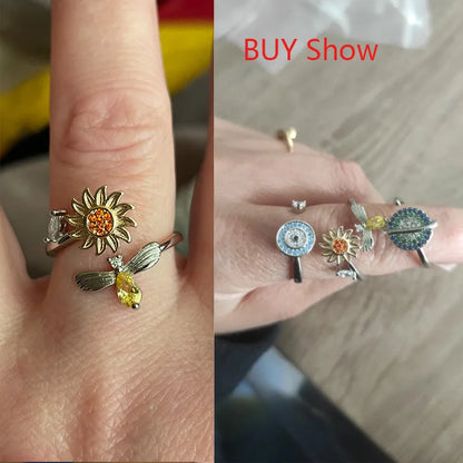 Sunflower fidget ring silver with yellow and orange accents worn on finger by Active Playthings