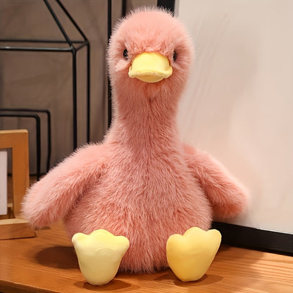 Pink snuggly duck plush toy with soft fur and yellow beak and feet by Active Playthings