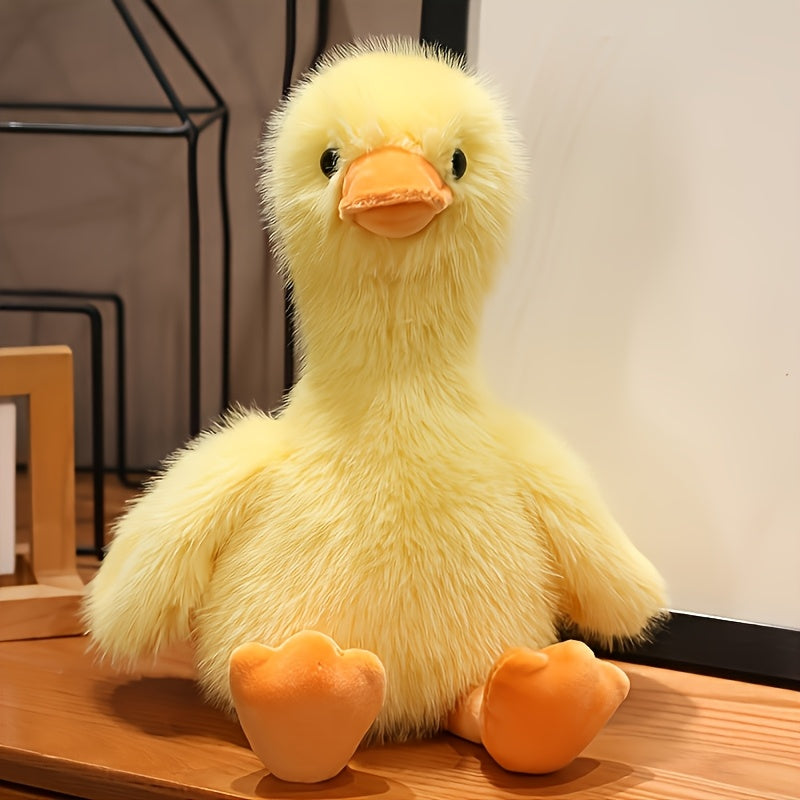 Active Playthings snuggly duck plush toy with soft yellow fur and orange beak and feet
