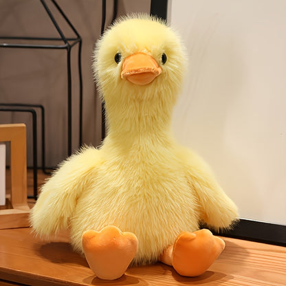 Active Playthings snuggly duck plush toy with soft yellow fur and orange beak and feet
