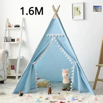 Blue teepee play tent for children with decorative pom poms and stuffed animals inside