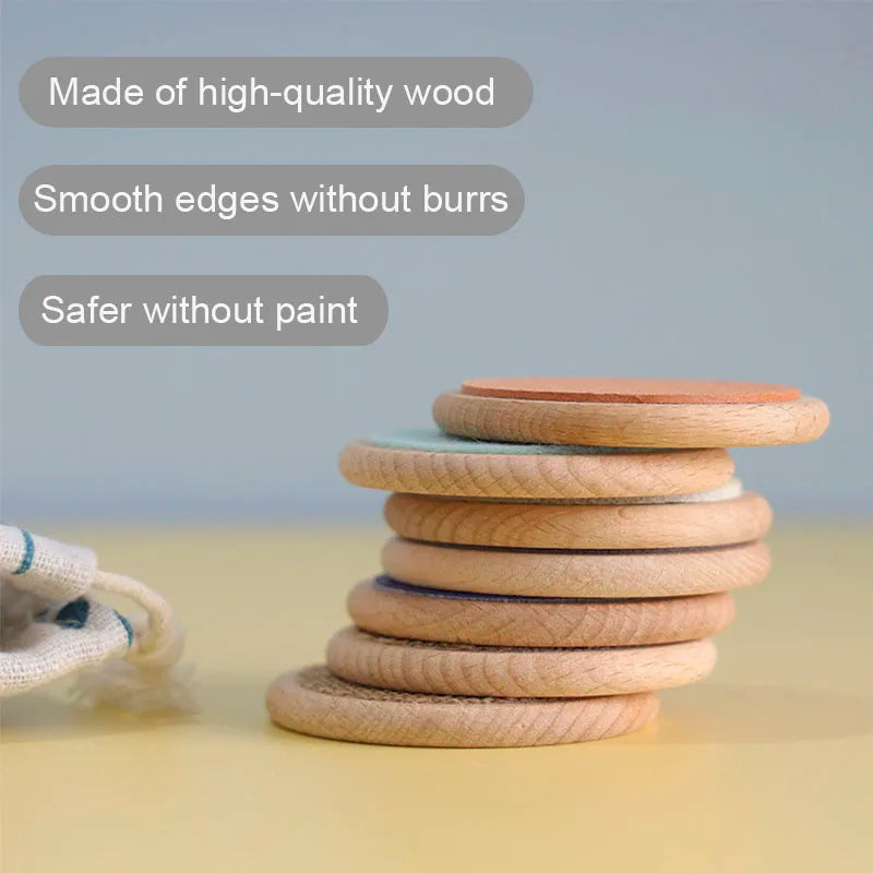 Stack of smooth wooden discs from ActivePlaythings, a therapeutic touch activity toy for sensory play