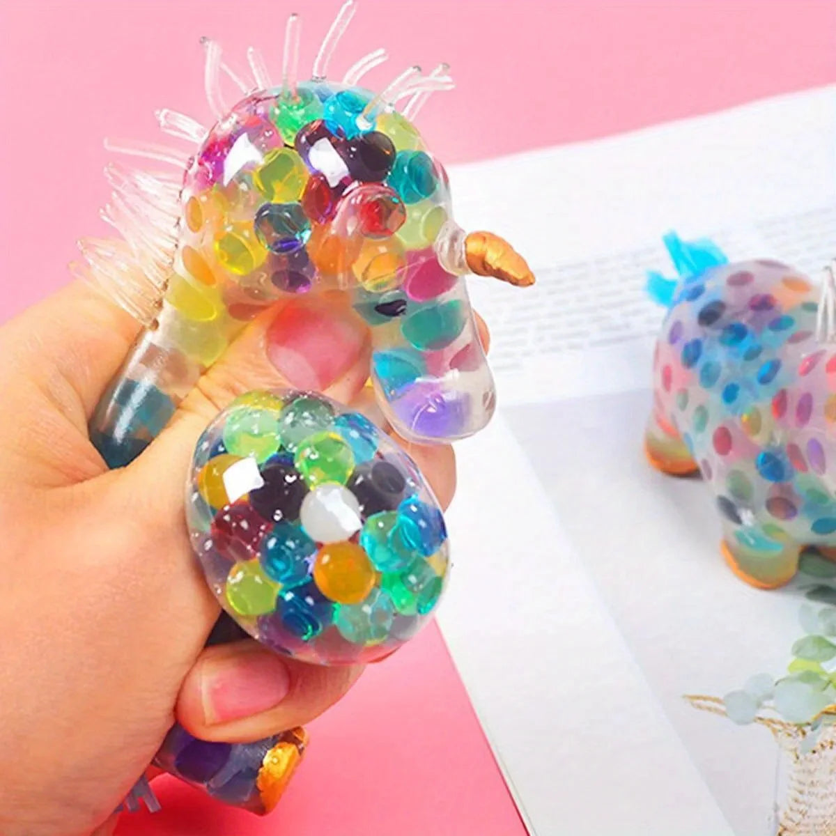 Colorful therapeutic unicorn squeeze toy designed for stress relief and sensory play